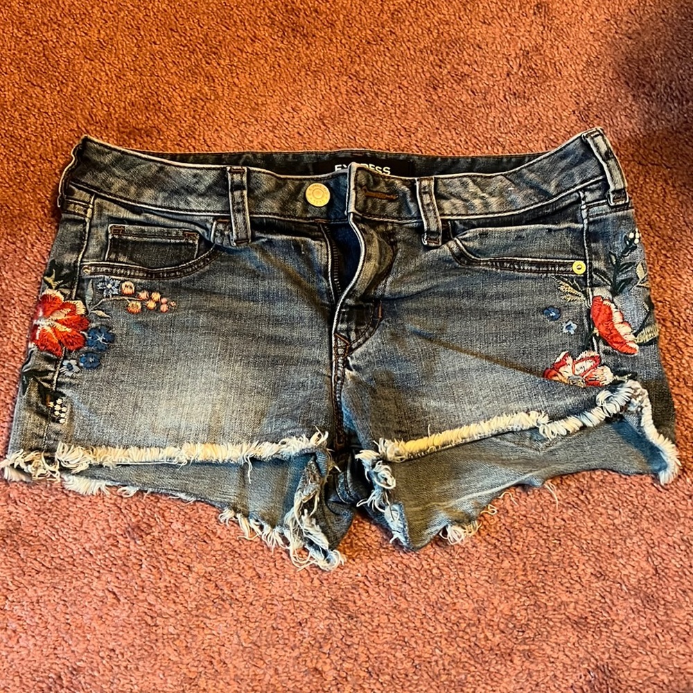 Express Size 2 Jean Shorts with a flower pattern on the 2 sides